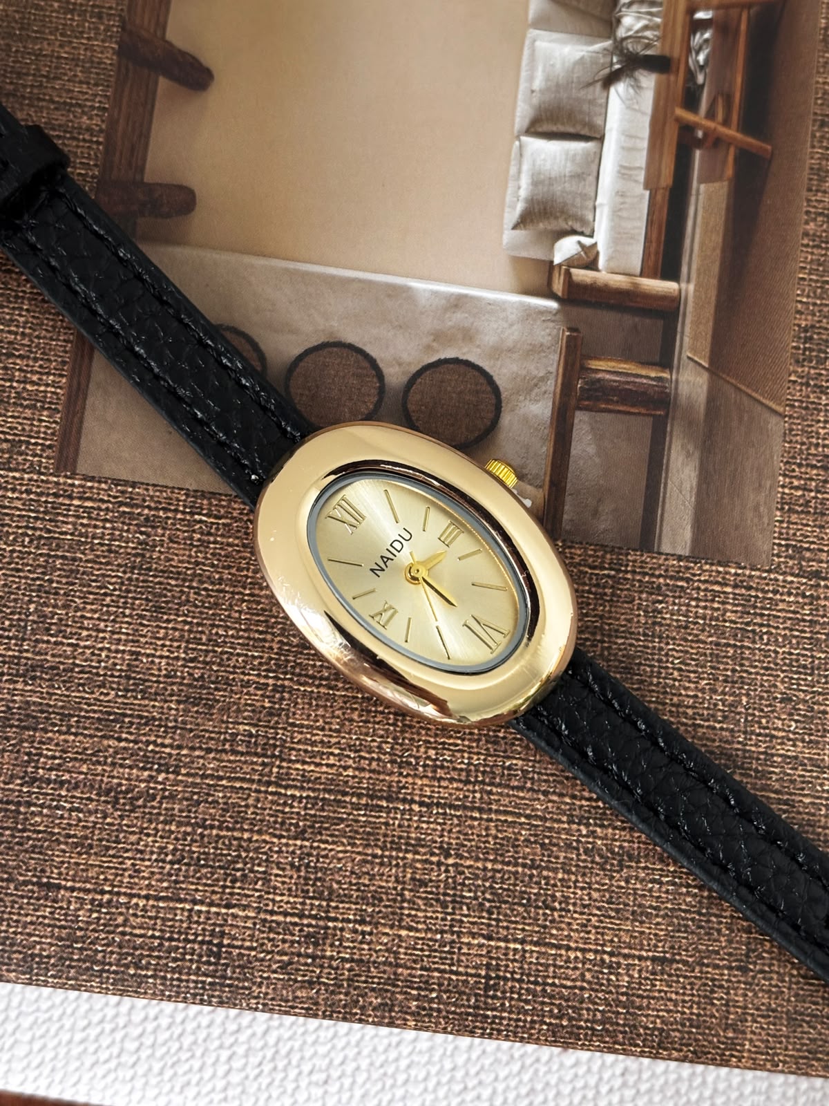 Classic Oval Gold Watch – Black Textured Strap